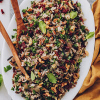 Platter of wild rice salad with mushrooms, herbs, and cranberries