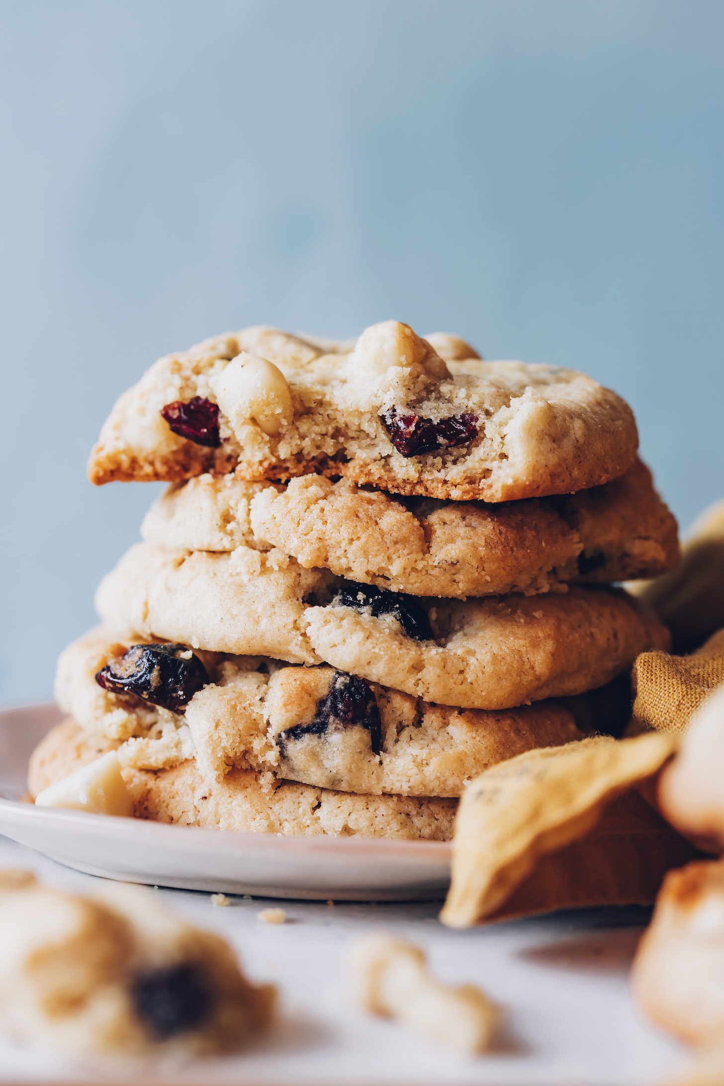 Stack of gluten-free vegan cranberry macadamia nut cookies