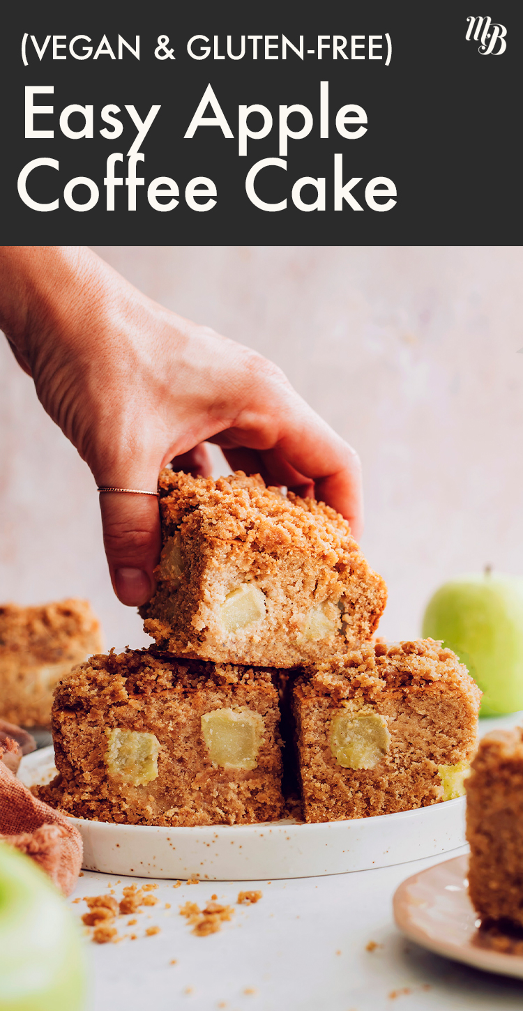 Hand holding a slice of vegan and gluten-free apple coffee cake