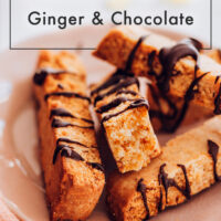 Plate of vegan and gluten-free chocolate and ginger biscotti