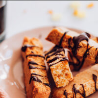 Plate of vegan and gluten-free chocolate and ginger biscotti