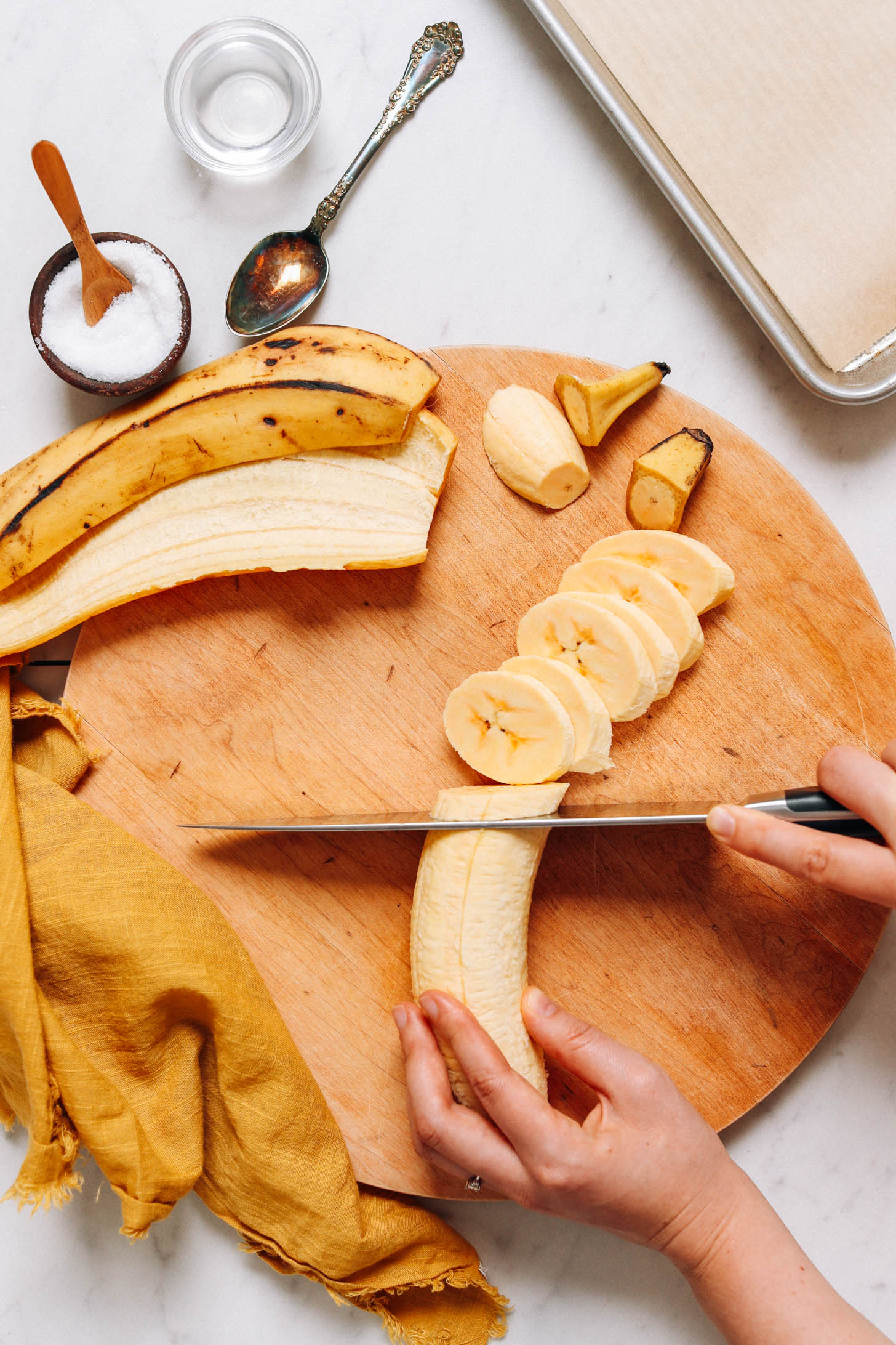 Showing how to slice plantain at an angle