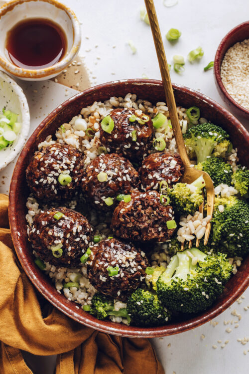 Bowl of rice, steamed broccoli, and ginger sesame vegan meatballs