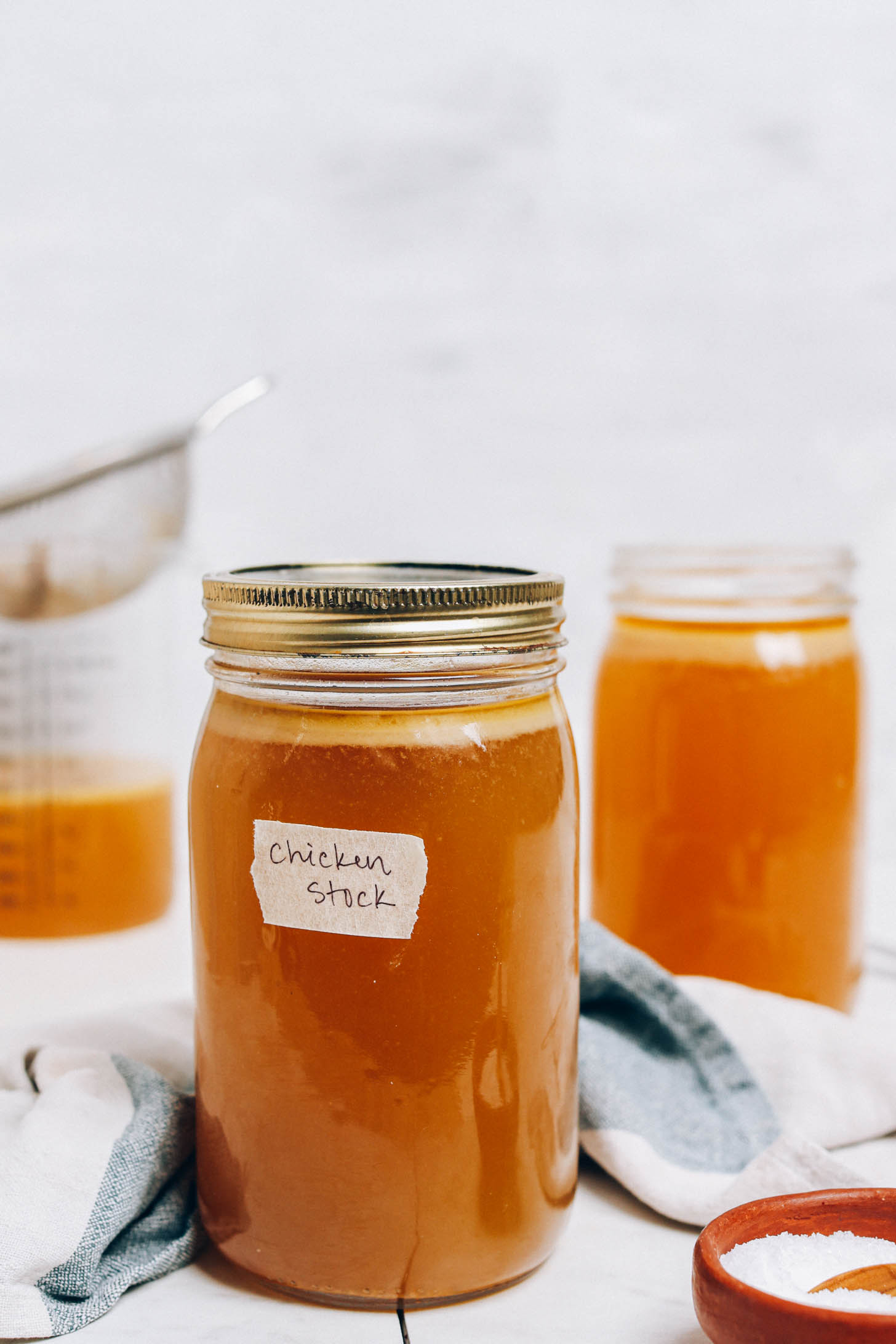 Jars of homemade chicken stock made in the Instant Pot