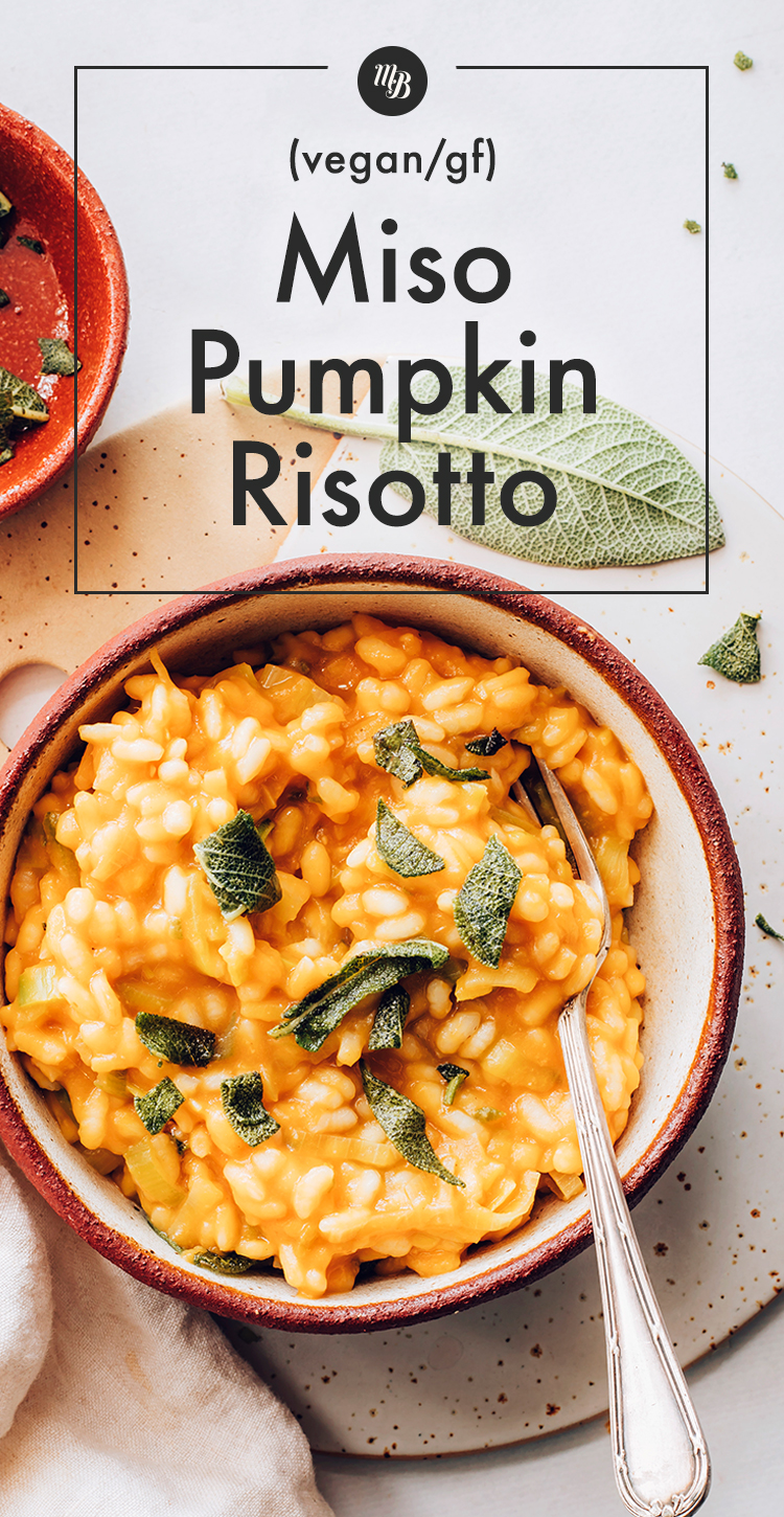 Bowl of pumpkin risotto topped with sage