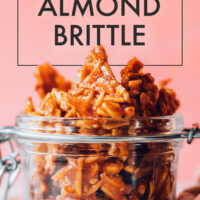 Jar of easy vegan and gluten-free almond brittle