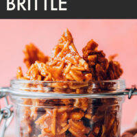 Jar of easy vegan and gluten-free almond brittle