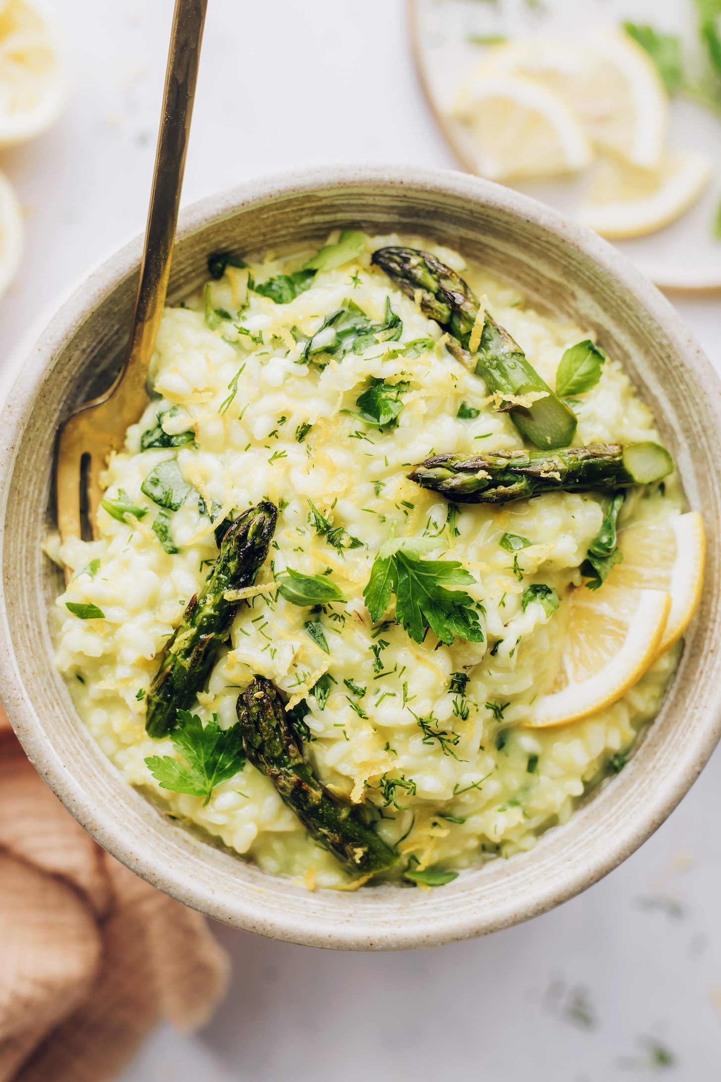 Lemon and herb risotto served with roasted asparagus