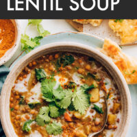 Bowl of vegan and gluten-free instant pot curried lentil soup with cilantro on top