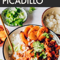 Bowl of easy vegan and gluten-free Cuban-inspired picadillo with plantains on the side