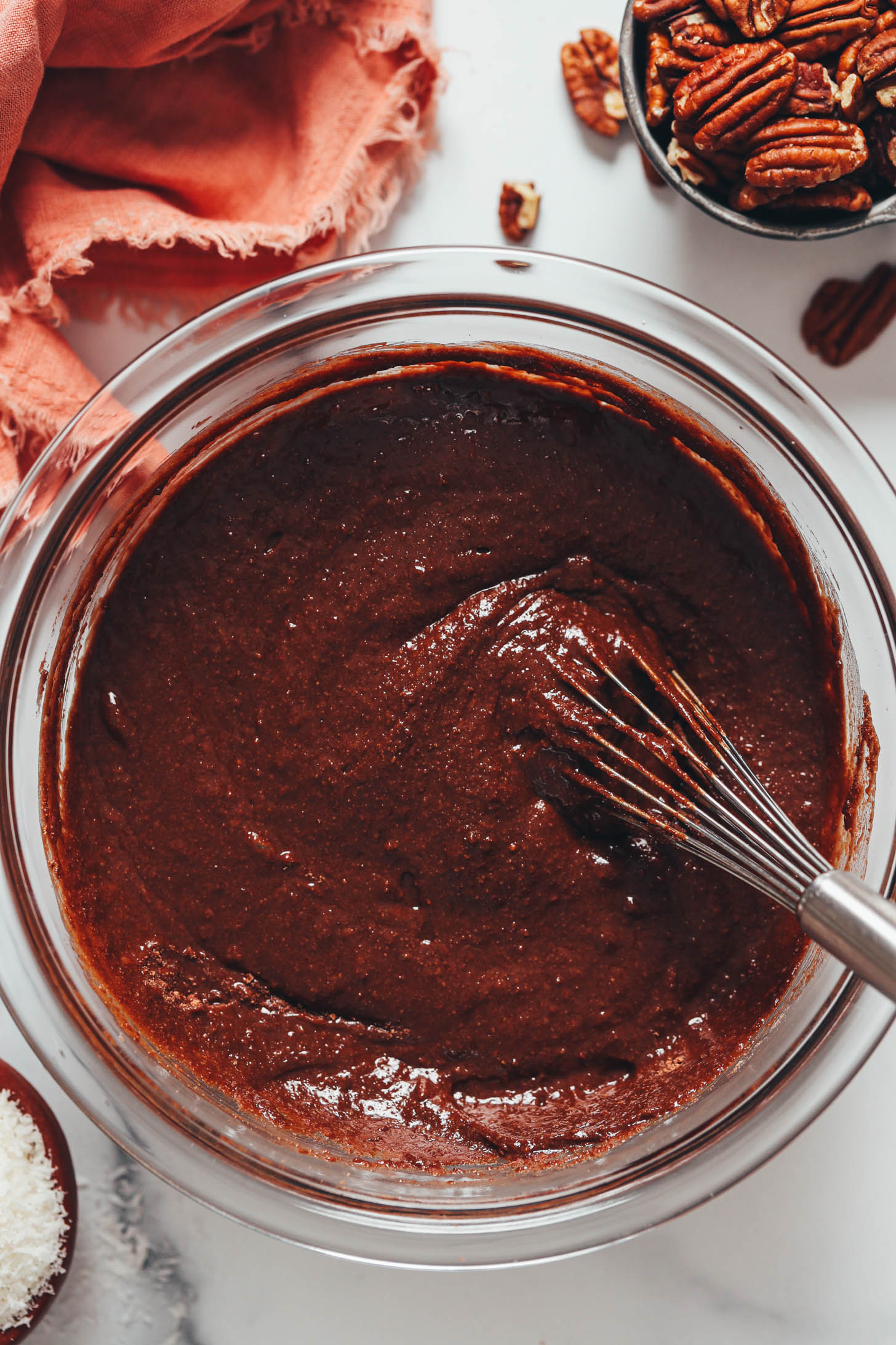 Whisk in a bowl of chocolate cake batter