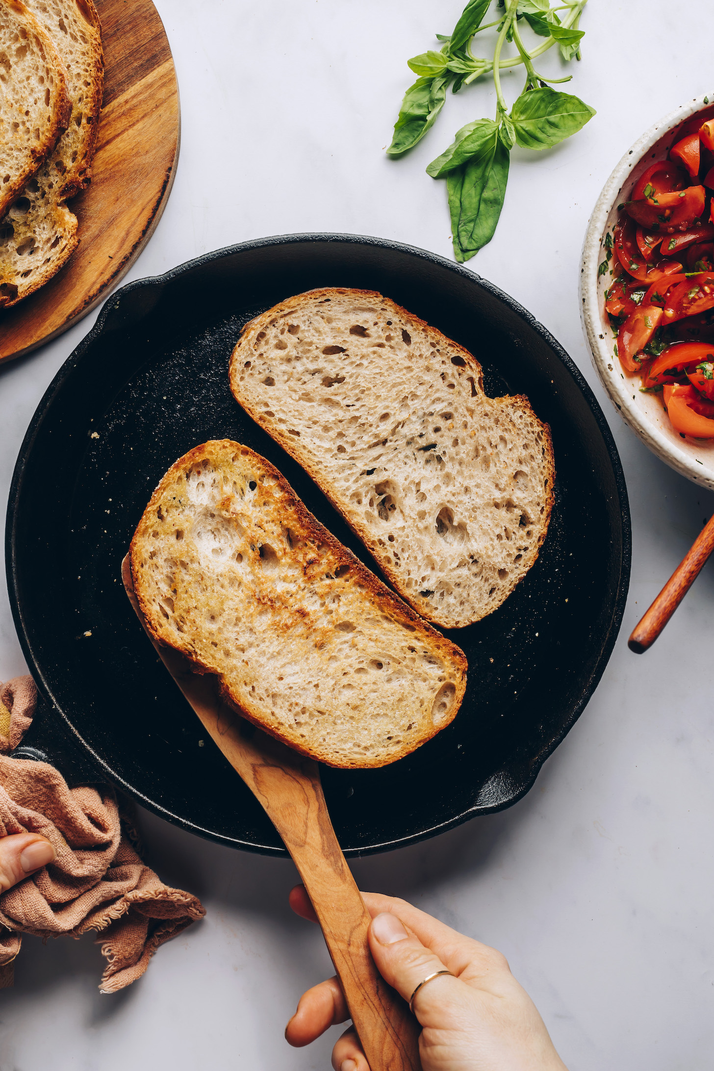 Toasting sourdough bread in a cast iron skillet