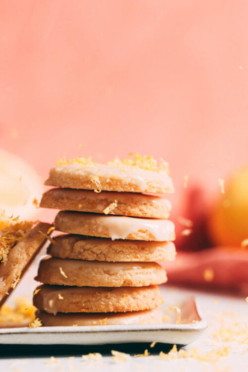 Stack of gluten-free vegan lemon cookies with lemon icing