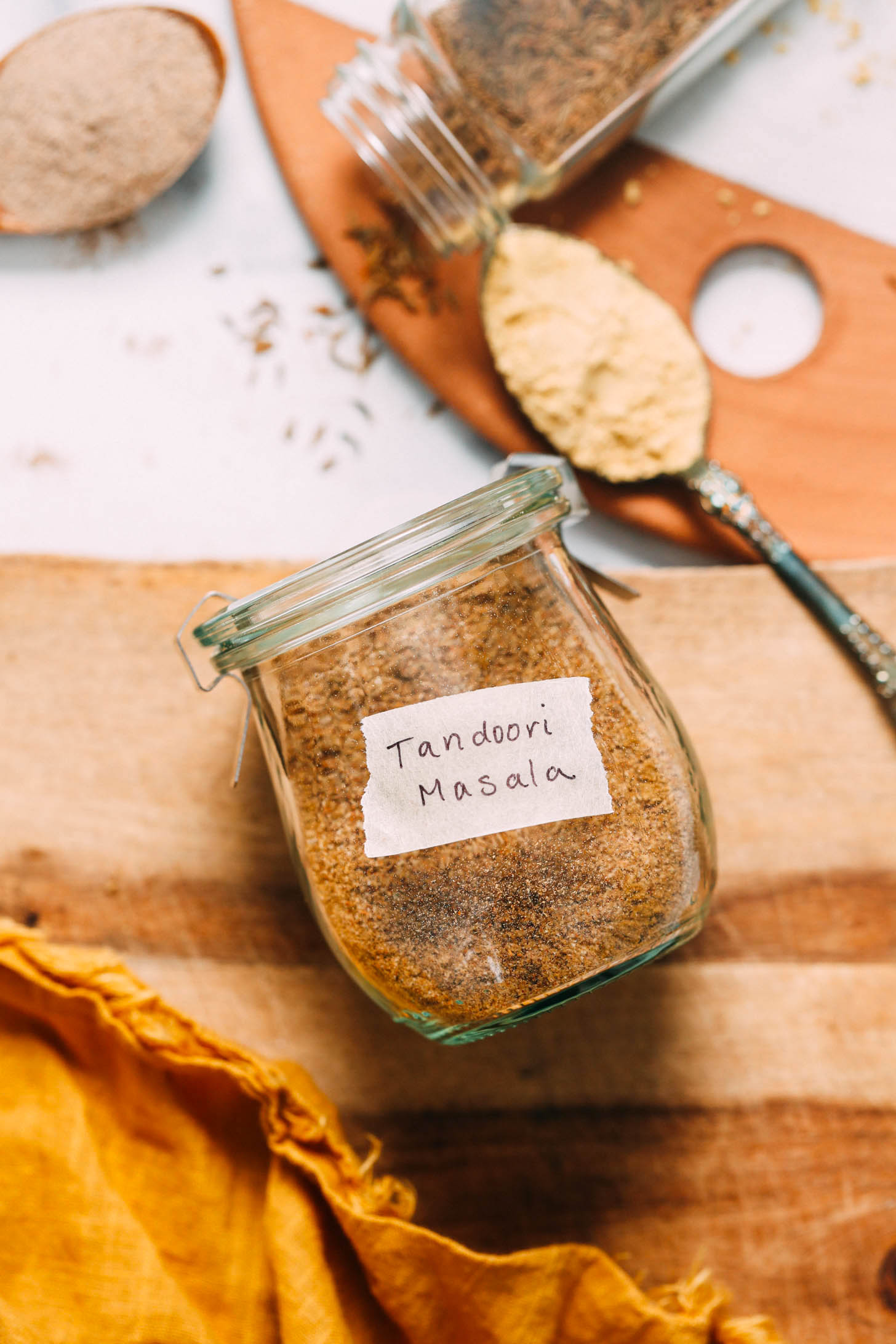 Jar of spices with a label saying tandoori masala
