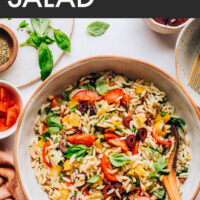 Bowl of colorful Mediterranean-inspired orzo pasta salad
