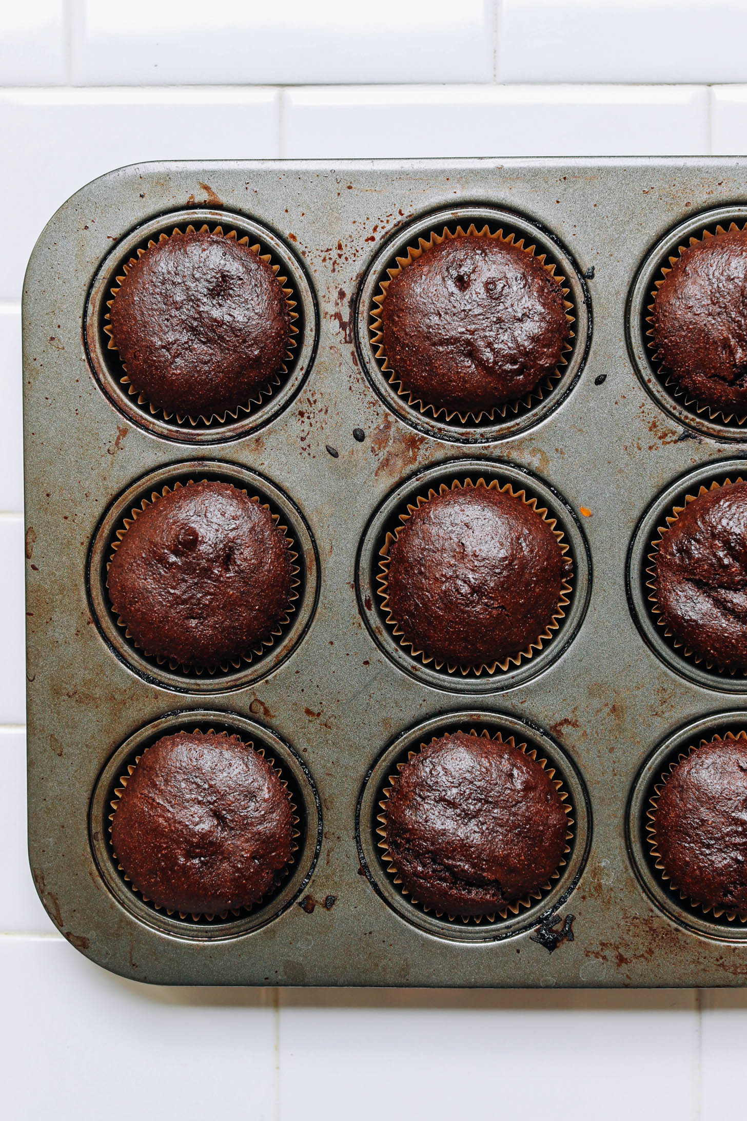 Chocolate cupcakes in a muffin tin