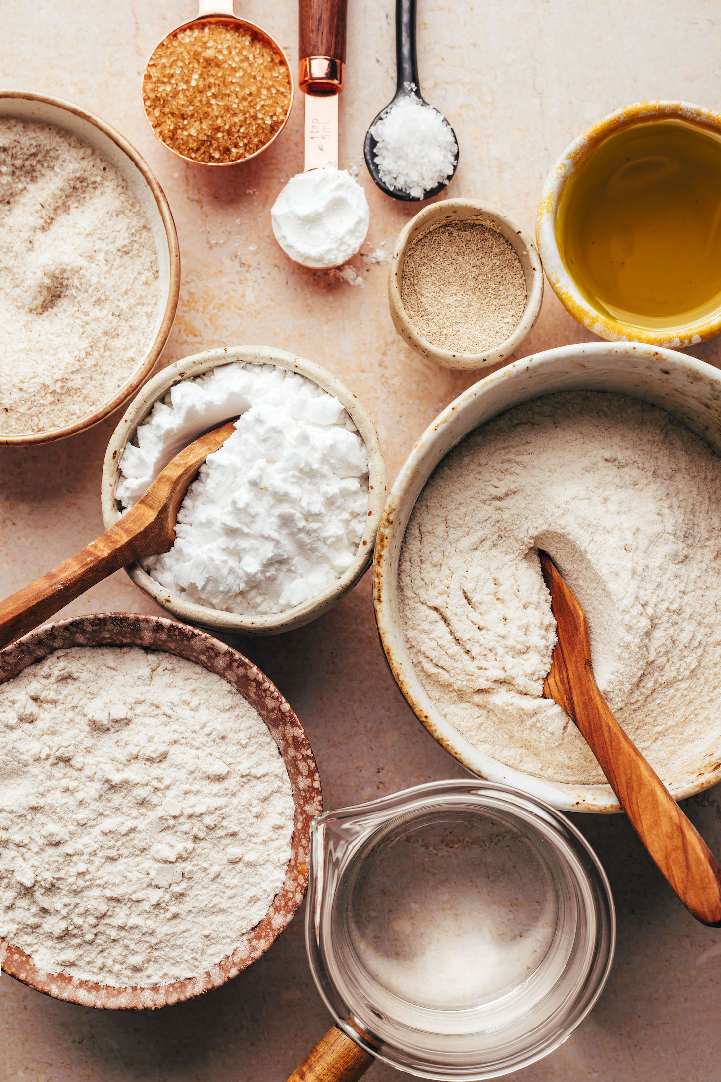 Psyllium, cane sugar, baking powder, salt, yeast, olive oil, brown rice flour, water, sorghum flour, and potato starch