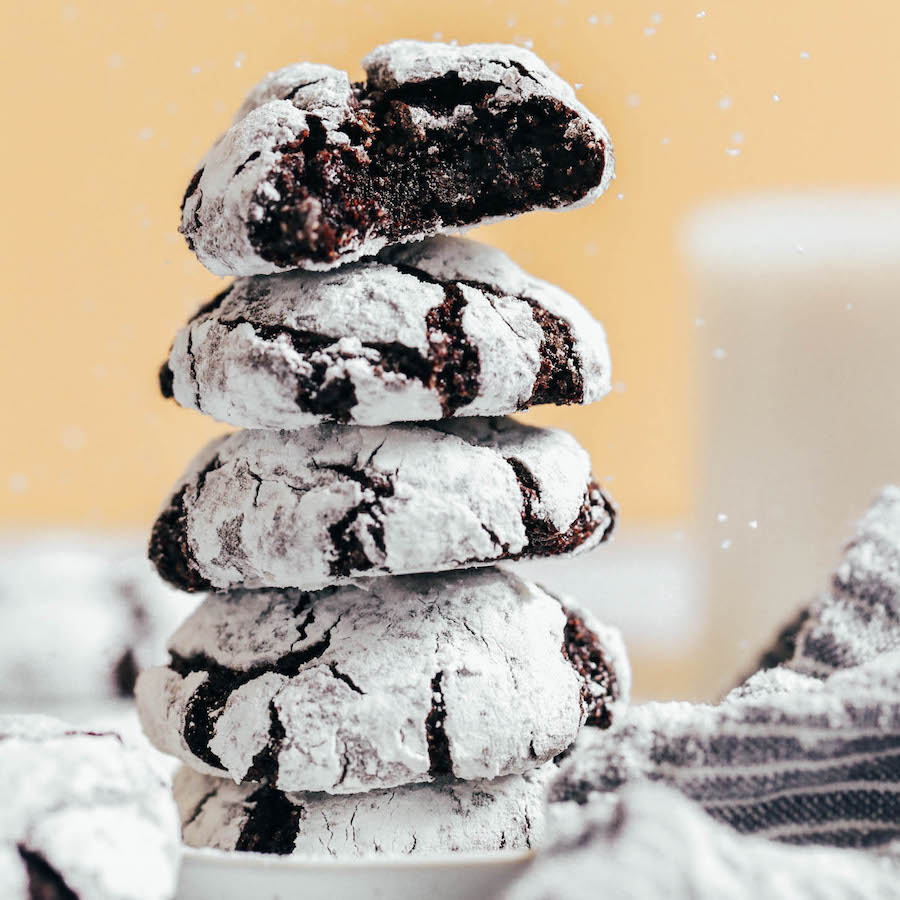 Stack of vegan gluten-free chocolate crinkle cookies
