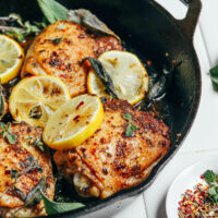 Pan of lemon and herb roasted chicken thighs