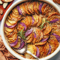 Garlicky vegan potato gratin in a baking dish