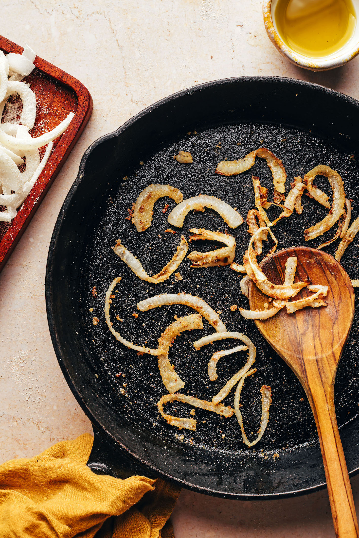 Cooking fried onions in a cast iron skillet