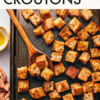 Baking sheet of garlicky homemade croutons