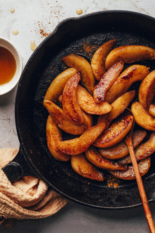 Cast iron skillet of cinnamon-spiced caramelized pears