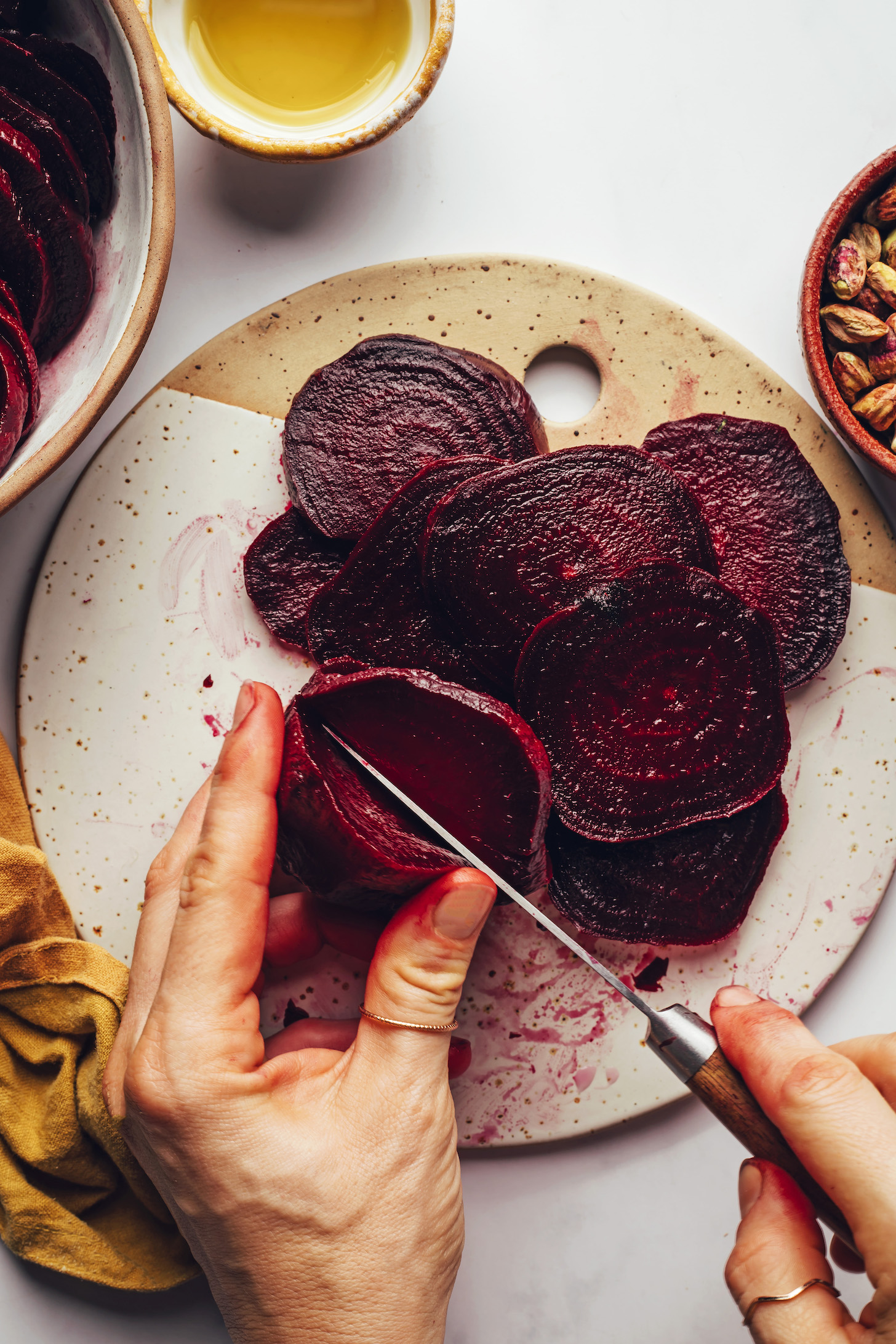 Slicing roasted beets into thin slices