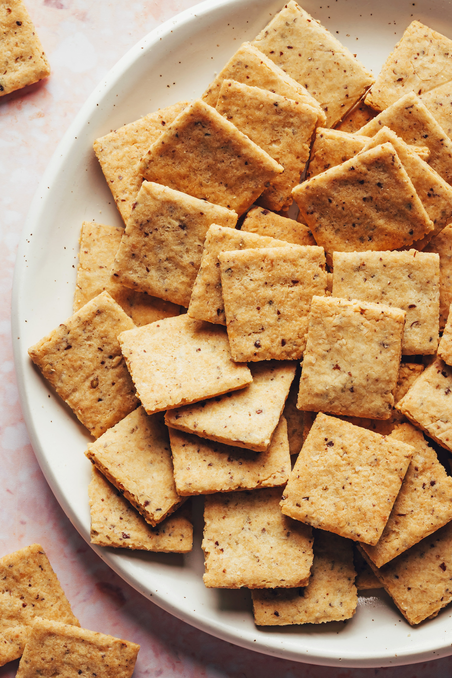 Bowl filled with homemade grain-free almond flour crackers
