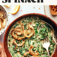Bowl of garlicky vegan creamed spinach