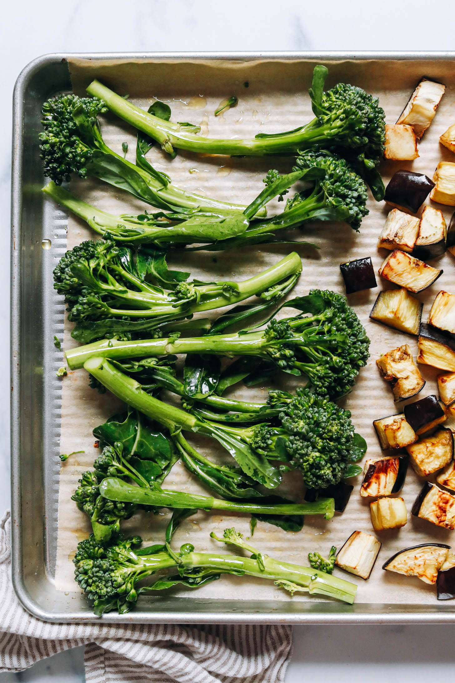 Sheet pan with broccolini and cubed roasted eggplant