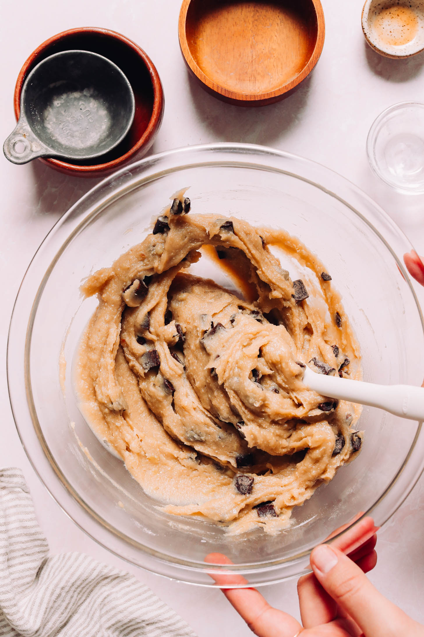 Rubber spatula in a bowl of chocolate chip blondie batter