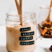 Pouring dairy-free chai-spiced coffee creamer into a jar