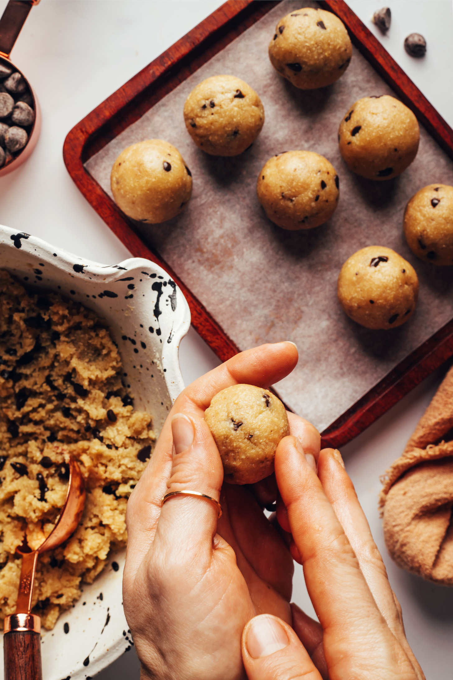 Rolling a no-bake cookie dough ball between hands