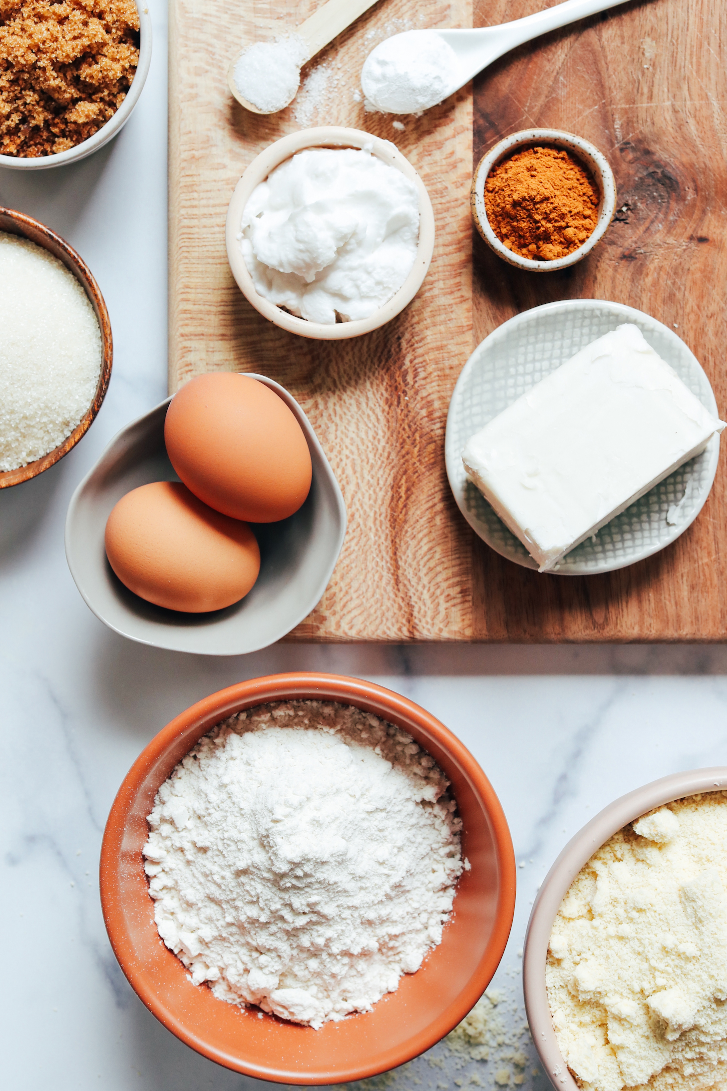 Brown sugar, cane sugar, gluten-free flour blend, eggs, baking powder, salt, cinnamon, vegan butter, and almond flour
