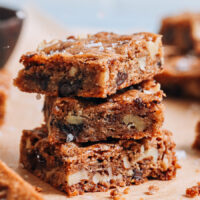 Stack of our vegan gluten-free chocolate chip cookie bars