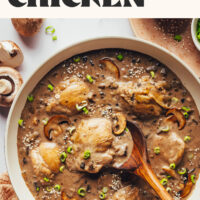 Pan of creamy dairy-free and gluten-free mushroom chicken topped with green onions