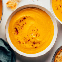 Overhead shot of a bowl of creamy carrot soup