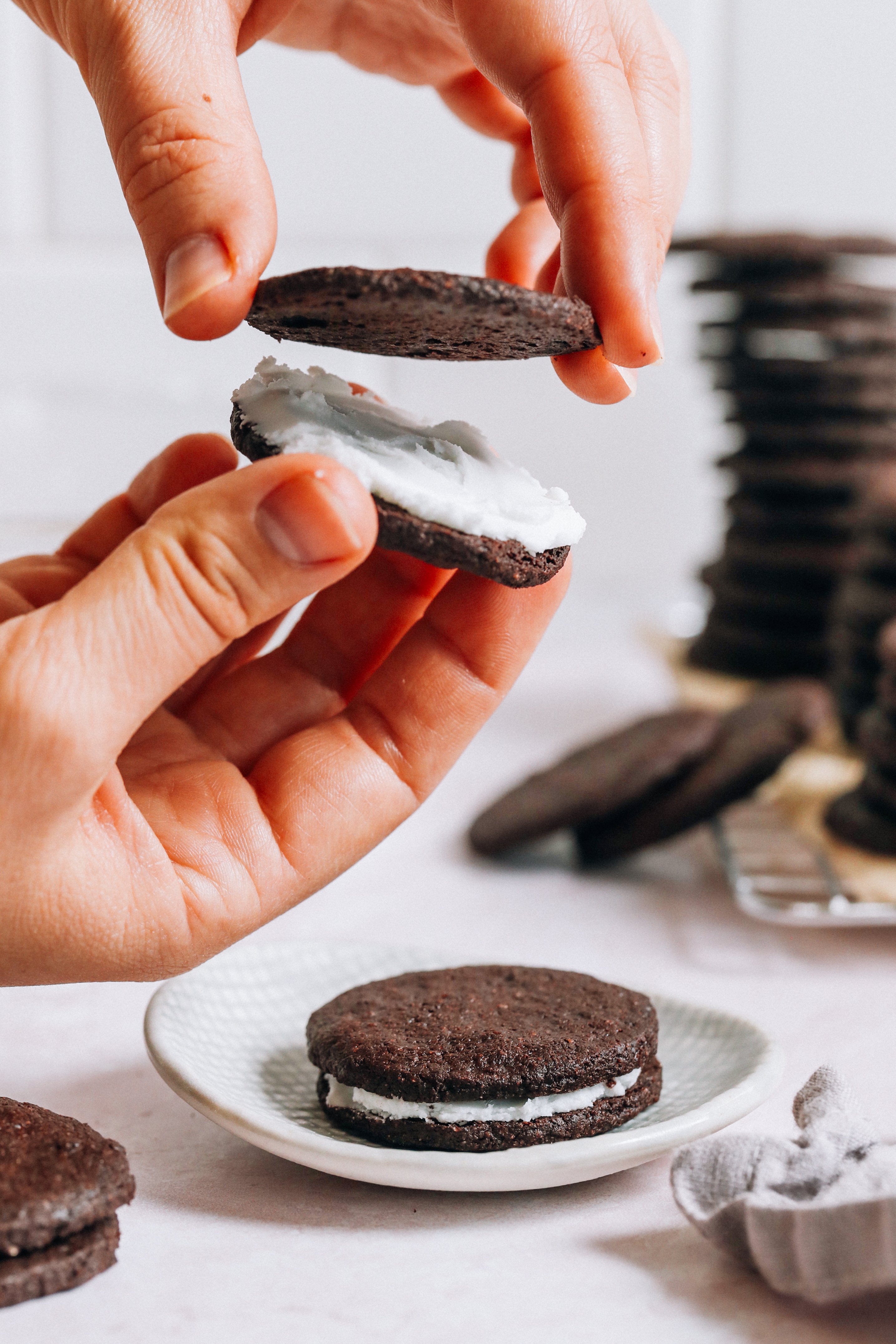 A sweet creamy filling sandwiching two chocolate cookies 