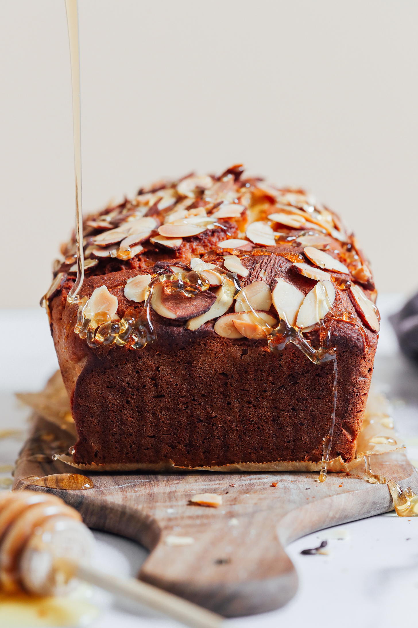 Drizzling honey onto a cake