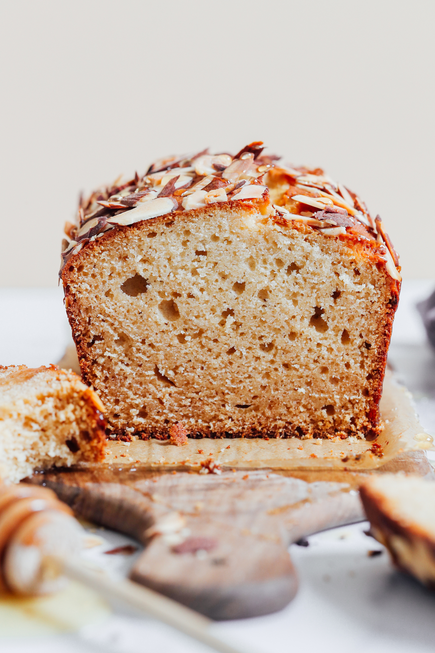 Showing the inner texture of our honey almond loaf cake