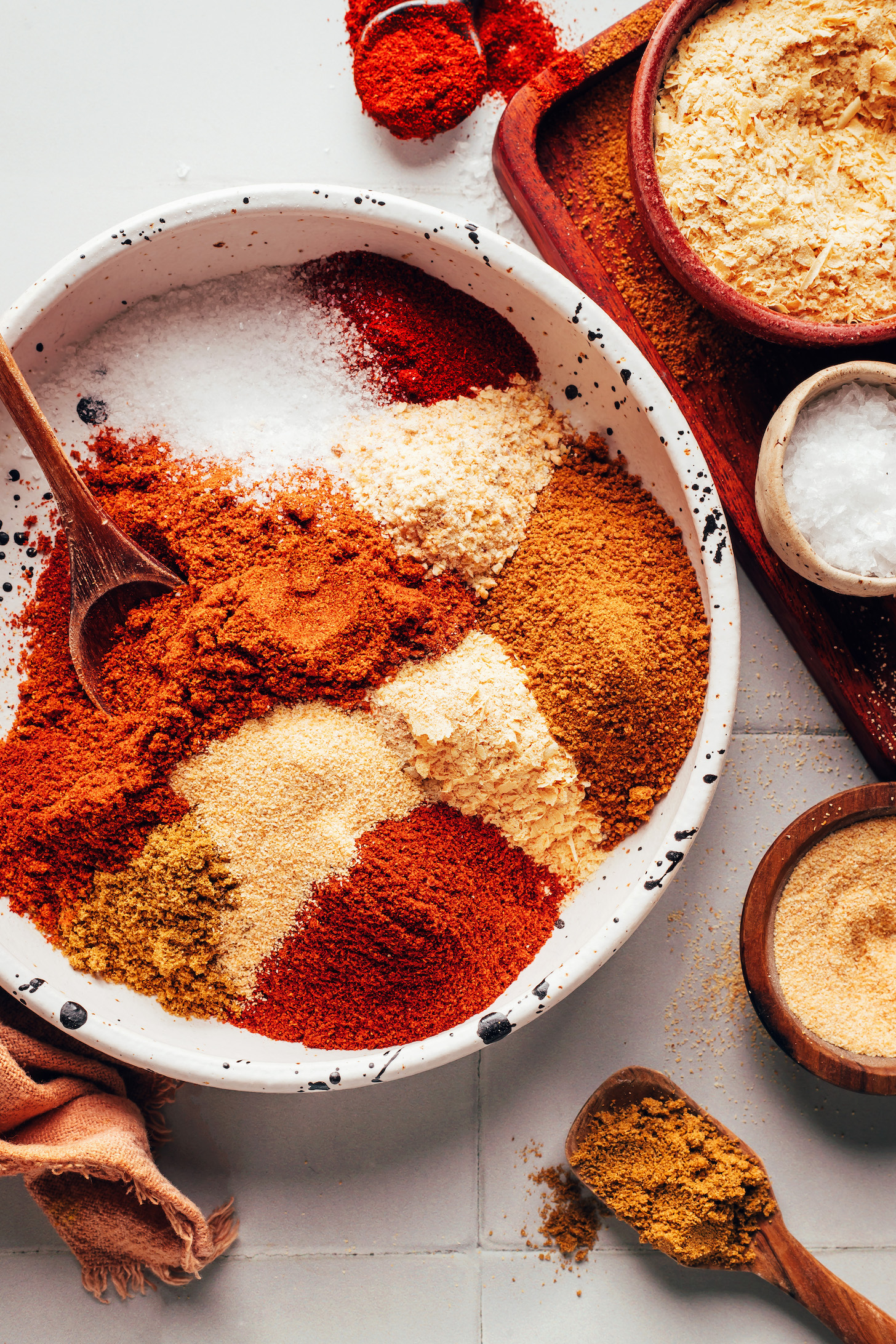 Ground spices and salt in a bowl before mixing