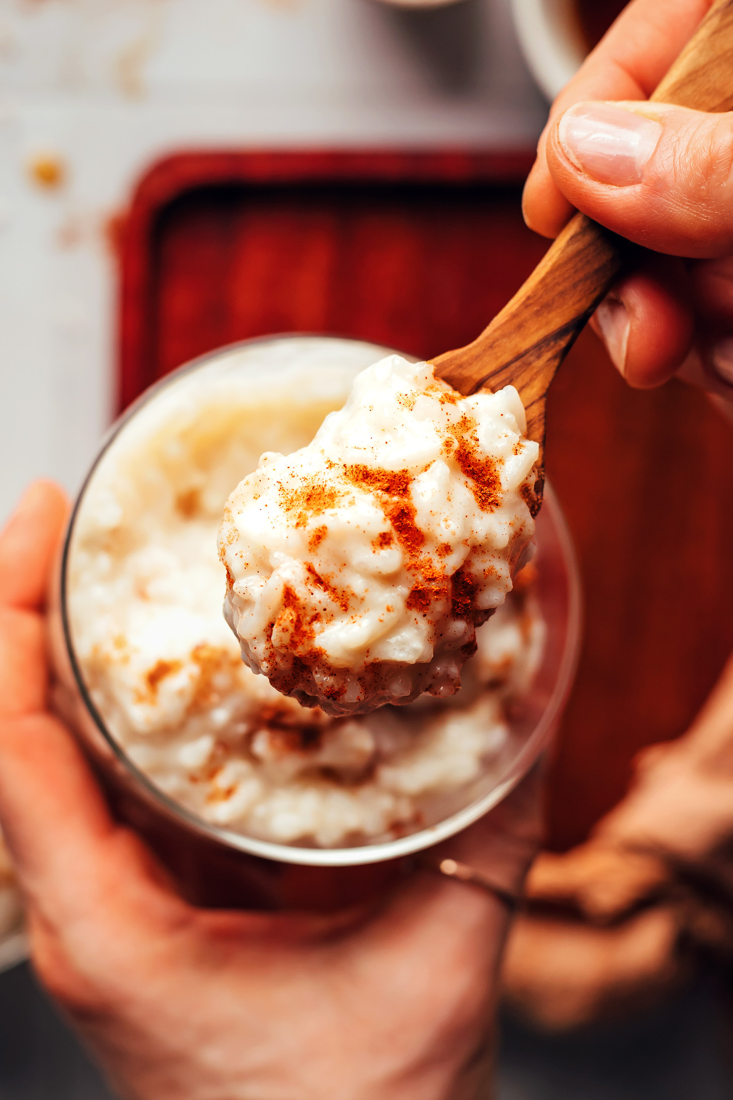 Take a bite of rice pudding and sprinkle with cinnamon