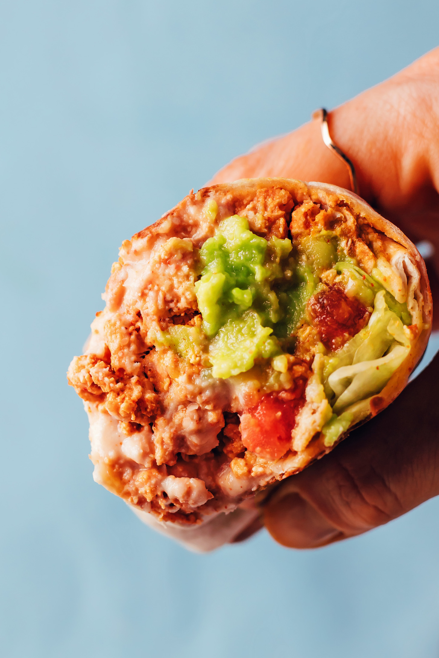 Close up shot of a vegan burrito inspired by a crunchwrap