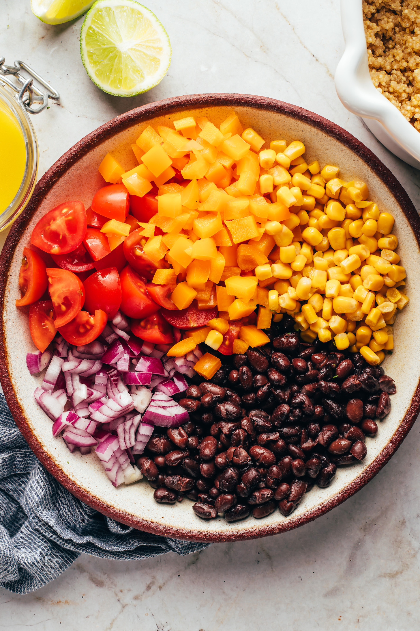 Cherry tomatoes, bell pepper, corn, black beans, and red onion