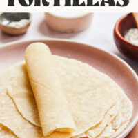 Plate of cassava flour tortillas with the top one rolled up