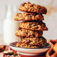 Stack of seedy quinoa breakfast cookies on a plate