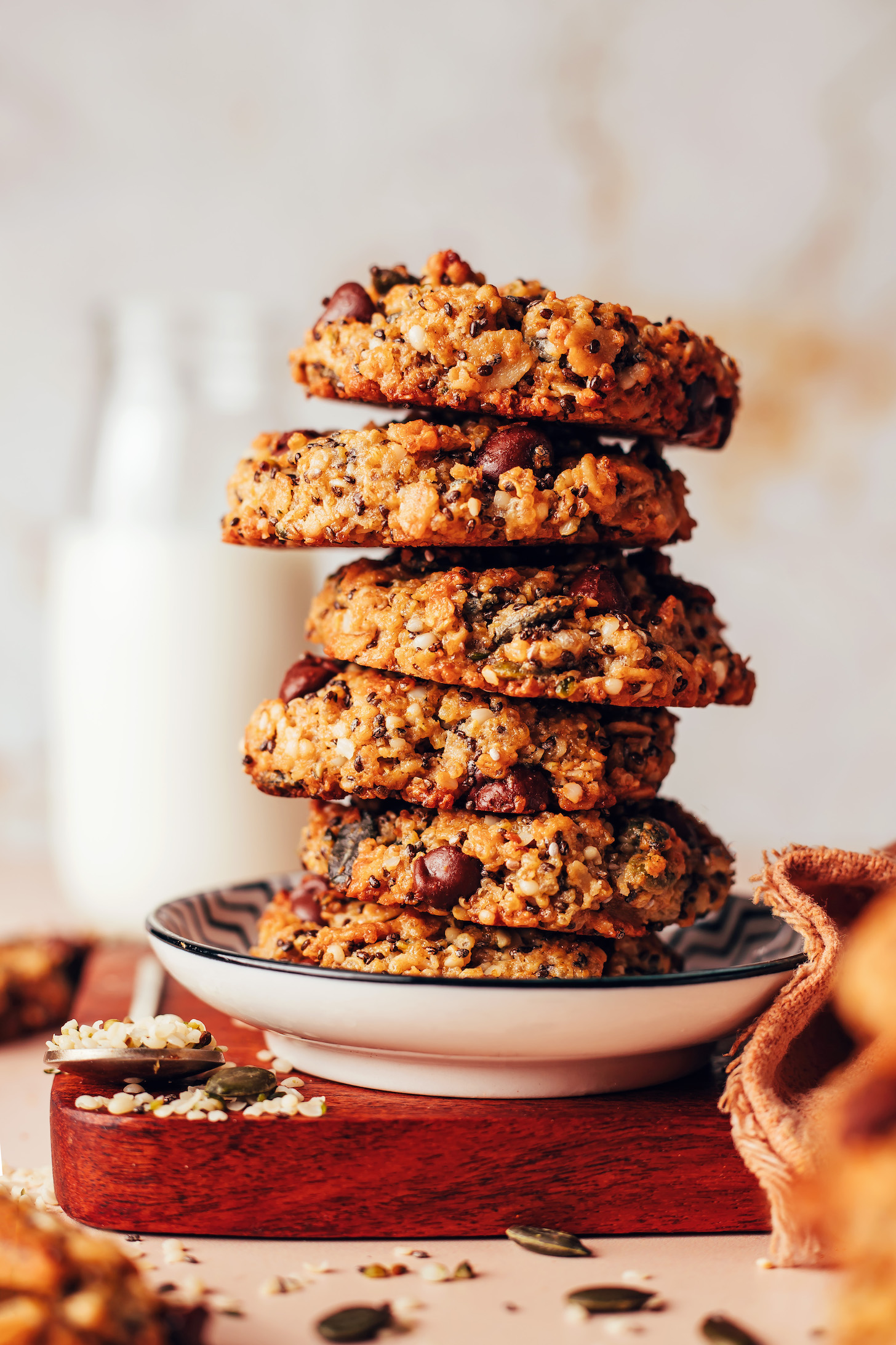 Stack of healthy quinoa breakfast cookies with seeds and oats