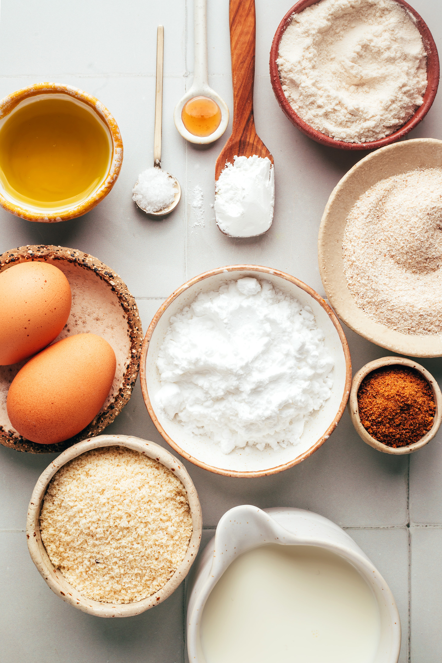 Eggs, oil, salt, vanilla, brown rice flour, cassava flour, potato starch, coconut sugar, almond flour, and dairy-free milk