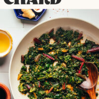 Cooking our sesame sautéed swiss chard recipe in a large skillet